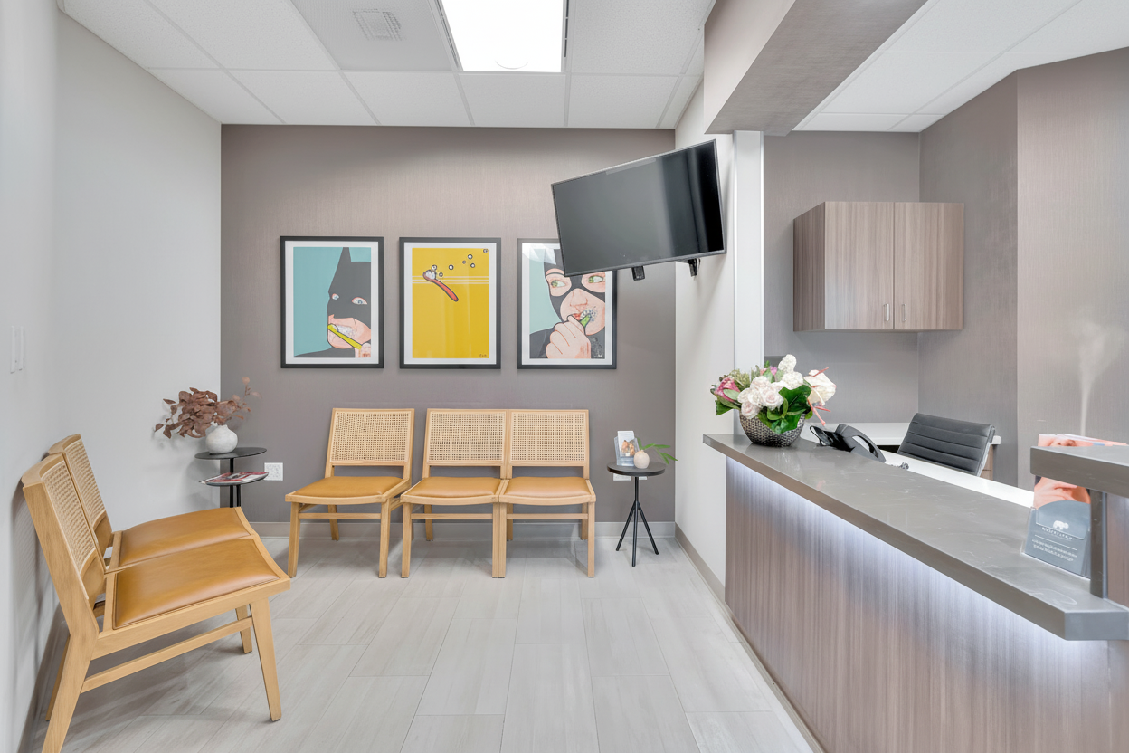 Bespoke Dental Studios waiting area with modern art and comfortable seating